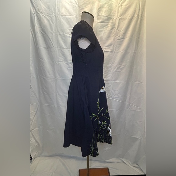 Poplin dress with embroidered birds across the bottom of the dress and the back - Picture 3 of 4